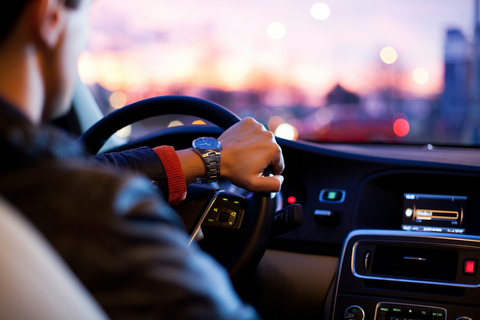 man driving a car wearing wrist watch, driver, policy